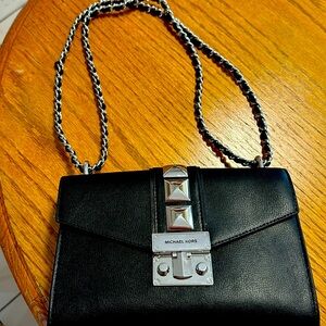 Micheal Kors black purse with silver hardware